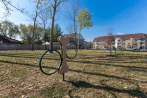 Dog park installation at Sandstone Apartments in Greenwood, Indiana with custom pet play equipment