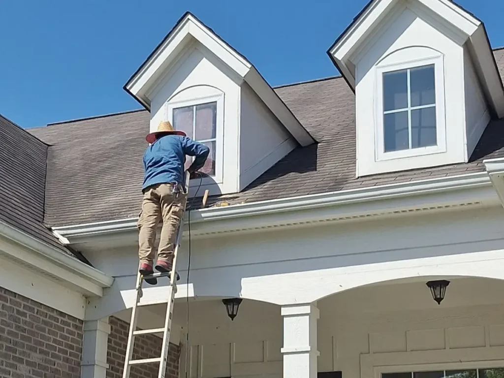 Crew completing dormer window replacement on a residential home in Fishers, Indiana