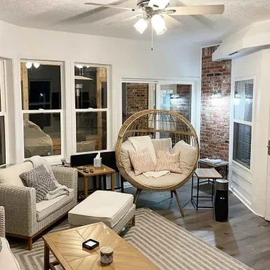 Cozy sunroom interior with new windows built as part of a room addition by AY Remodeling